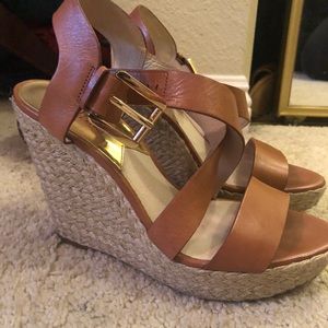Michael Kors wedges with espadrilles bottom.